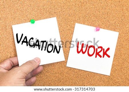 paper note with text ( vacation or work ) pin on corkboard  with hand holding , decision concept