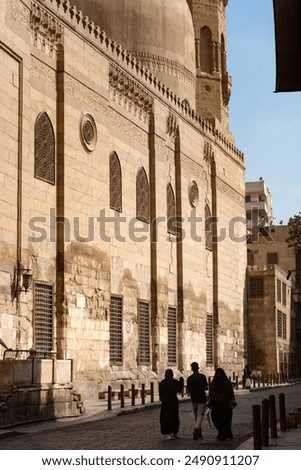 Similar – Image, Stock Photo Tourists walking past the Colosseum during the day. Rome. Italy.