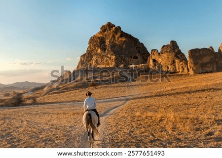 Similar – Image, Stock Photo Local man with cowboy hat sitting at dock along lake Atitlan at the coast of Santa Cruz la Laguna, Guatemala