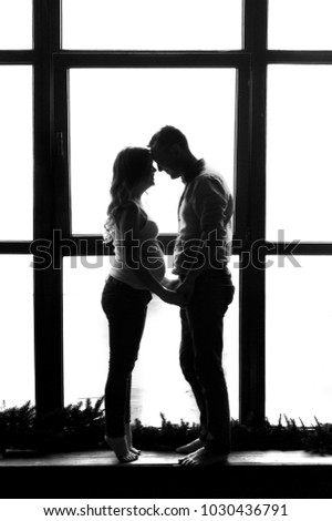 Similar – Image, Stock Photo Silhouette of a pregnant woman against an oceanic landscape