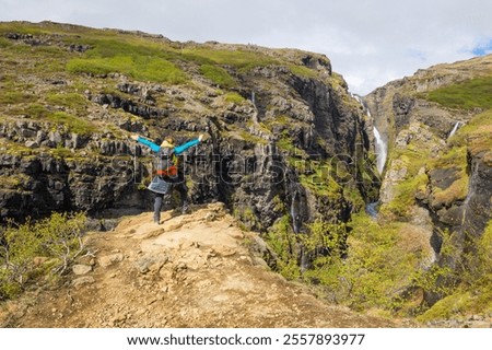 Similar – Foto Bild Wanderer oder Touristen stehen bei Sonnenuntergang auf einem Berggipfel