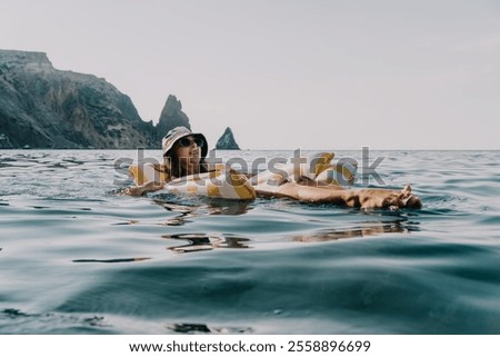 Similar – Image, Stock Photo Calm sea near rocky shore with buildings