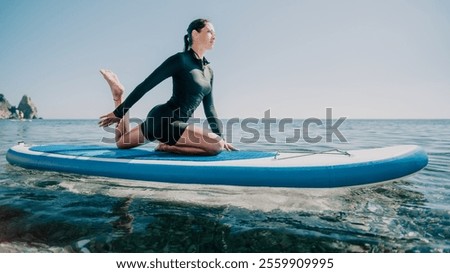 Similar – Image, Stock Photo Woman practicing on paddleboard in sea