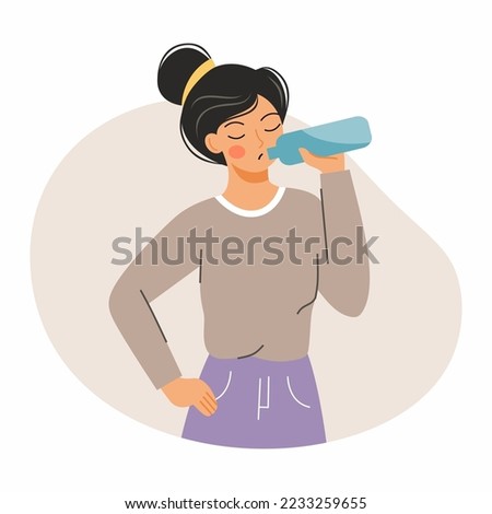 Woman drinks water from plastic or glass bottle.  Useful habit. Morning routine. Maintaining water balance in body.