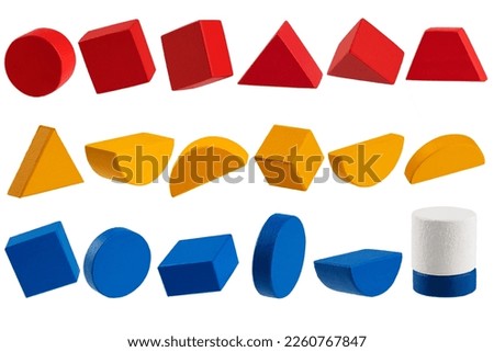 geometric figures made of wood, painted and stacked on a table, isolated Foto stock © 