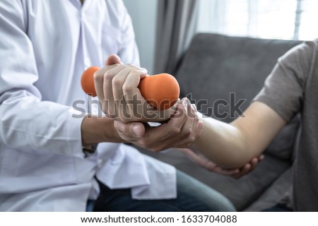 Similar – Image, Stock Photo rehabilitation therapy. Hands treating a young woman’s shoulder