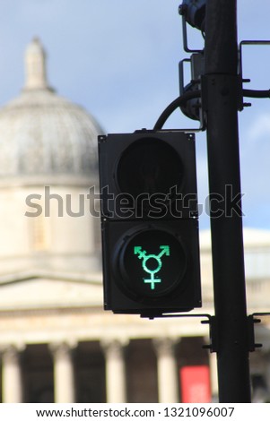 Similar – Image, Stock Photo LGBT pedestrian traffic light signals symbolizing equality