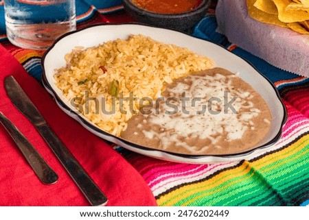 Similar – Image, Stock Photo Tasty rice with beans in bowl on table