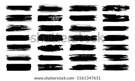Brush paint strokes. Texture brushes and modern grunge brush lines. Ink brush artistic design element for frame design. Vector isolated elements set. Grungy black swatches. Rough smears and stains