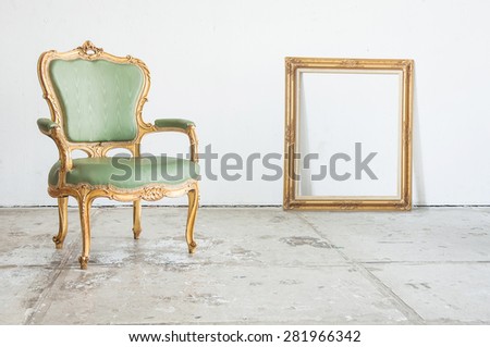 Luxury green vintage style armchair sofa with frame in a vintage room