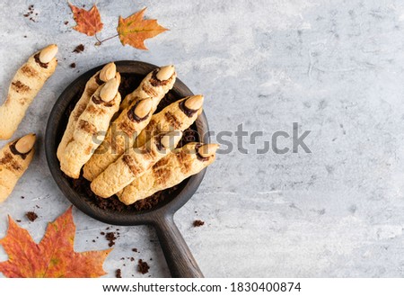 Similar – Image, Stock Photo Cookies fingers and pumpkin hummus