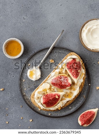 Similar – Image, Stock Photo Fresh figs in a rustic bowl on a beige linen tablecloth.