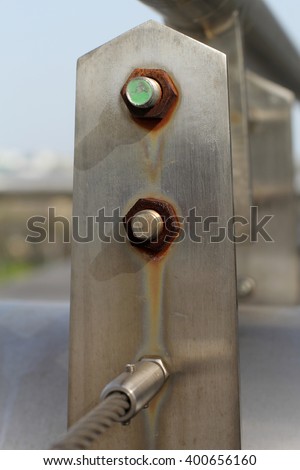 Fence focused on rusty screw-nut Stock fotó © 