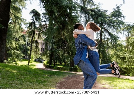 Similar – Image, Stock Photo Young man lifts his bike