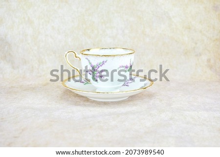 Similar – Image, Stock Photo Tea bowl fine blue and white patterned in Japanese Tokusa design with freshly brewed Assam organic black tea on which some air bubbles float