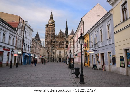 KOSICE, SLOVAKIA - april 11, 2015: Tourists walk through city center on April 11, 2015 in Kosice, Slovakia. Kosice is a city in eastern Slovakia with a population of approximately 240,000.