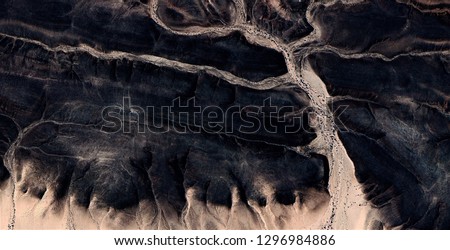 the Enchanted Forest, abstract photography of the deserts of Africa from the air, aerial view of desert landscapes, Genre: Abstract Naturalism, from the abstract to the figurative, contemporary photo 