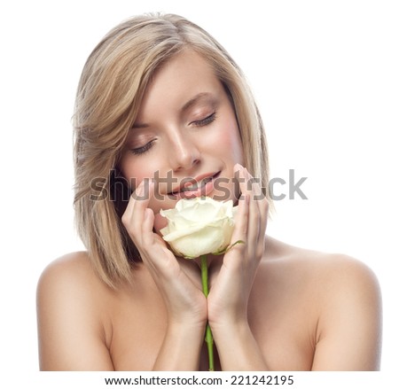 closeup portrait of attractive  caucasian smiling woman blond isolated on white studio shot lips face hair head and shoulders eyes closed flower white rose aroma