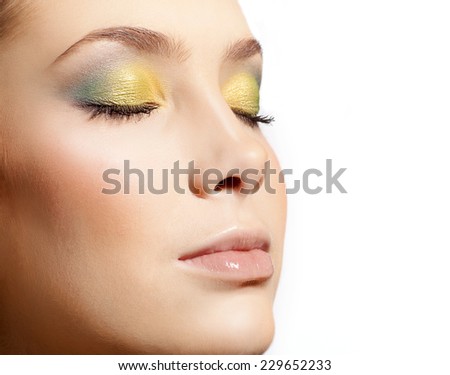 closeup portrait of attractive  caucasian  woman  isolated on white studio shot lips  face closeup makeup  head eyes closed skin