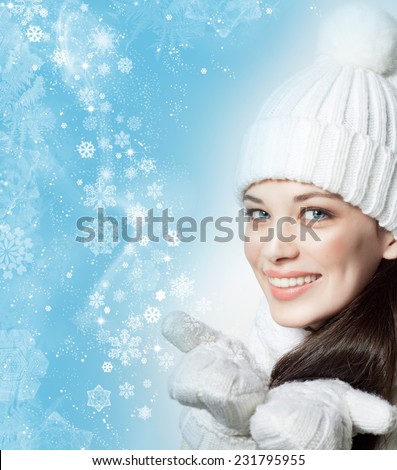 beauty face portrait of attractive young caucasian woman in warm clothing  studio shot isolated on white toothy smiling winter