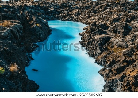 Similar – Foto Bild Gesteinsformationen im fließenden Meer