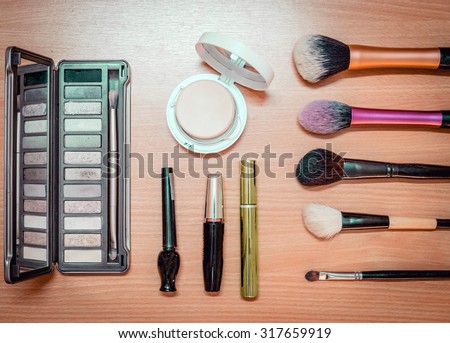 Make up cosmetic brush product beauty fashion on wood background