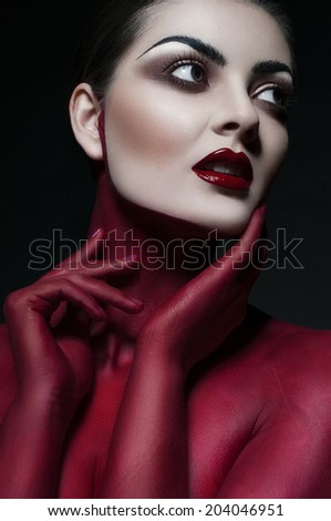Beauty portrait. Mysterious woman. Fantasy make-up. Creative make-up. Studio shot