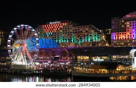 SYDNEY, AUSTRALIA - JUNE 7, 2015: Darling Harbour during Vivid Sydney festival. Vivid Sydney is an outdoor annual cultural event featuring immersive light installations and projections.