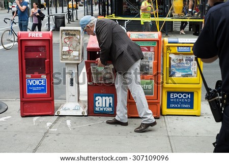 NEW YORK CITY, UNITED STATES - JUNE 20, 2015: Newspapers stands are part of the daily life in New York City.