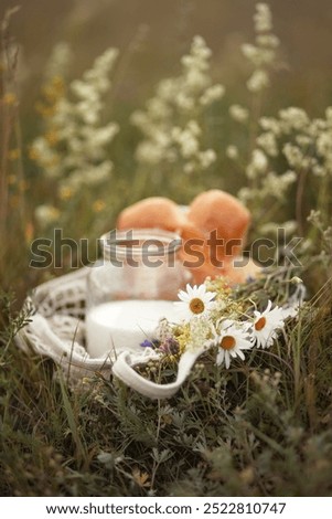 Similar – Foto Bild Frische Blumen im Becher auf Holztisch