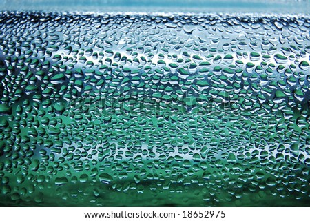 Raindrops creating wonderful aquamarine background