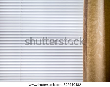 Metal Blinds with drawstring. Roller Shutter Background with curtain.