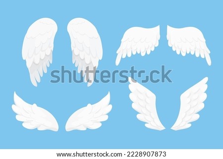 Set Angel wings white in cartoon style isolated on blue background, design element for decoration.