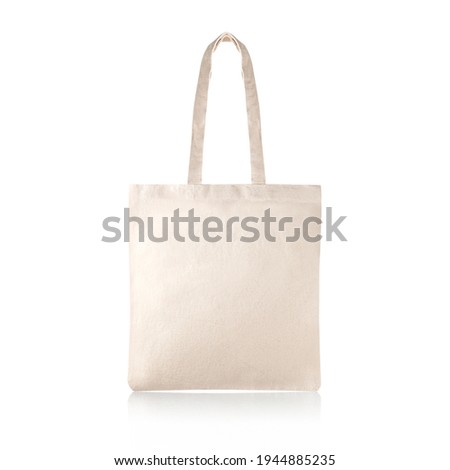 Blank Eco Friendly Beige Colour Fashion Canvas Tote Bag Isolated on White Background. Empty Reusable Bag for Groceries. Clear Shopping Bag. Design Template for Mock-up. Front View. Studio Photography.