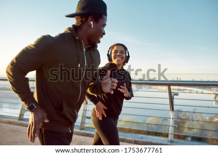 Similar – Image, Stock Photo Two black men running outdoors