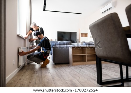 Similar – Image, Stock Photo Aged repairman in professional workshop with tools