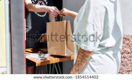 Similar – Image, Stock Photo Person with paper bag on head pointing at camera