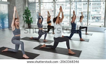 Similar – Image, Stock Photo Women practicing yoga together on rooftop