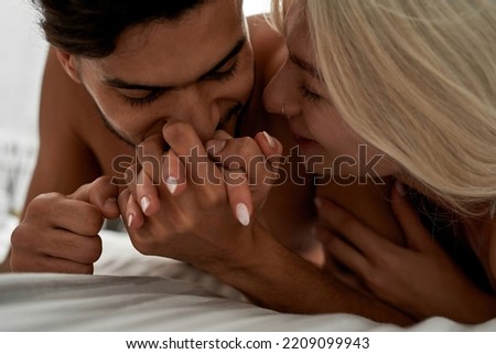 Similar – Image, Stock Photo Crop multiracial couple touching index fingers