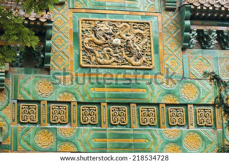 Chinese ornaments on green stone in Lama Temple, Beijing, China