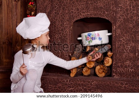 Little chef cooks in a wood burning stove, chef, Scullion