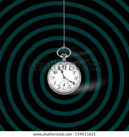 Old pocket watch swinging on spiral background, hypnosis concept