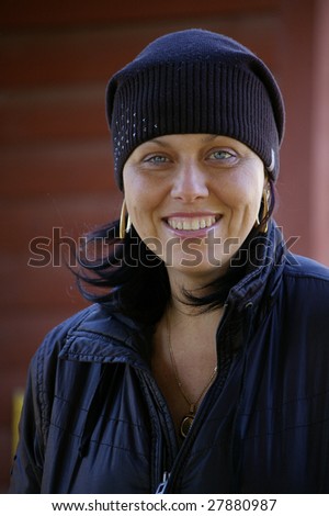 Beautiful woman in  black smiles