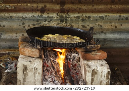 Food cooking on open fire in a remote village in Cedeno Honduras