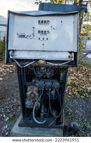 Similar – Image, Stock Photo Old dilapidated fuel pump for liquid fuel in detail with reflection of a blue oh so environmentally friendly xyz car