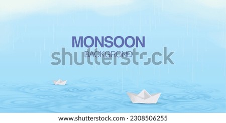 Rain drops falling on water creating ripples with paper boats sailing on water.