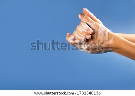 Similar – Image, Stock Photo Flatlay of woman rubbing cream in her legs in bed