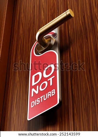 Do not disturb sign on the hotel room door