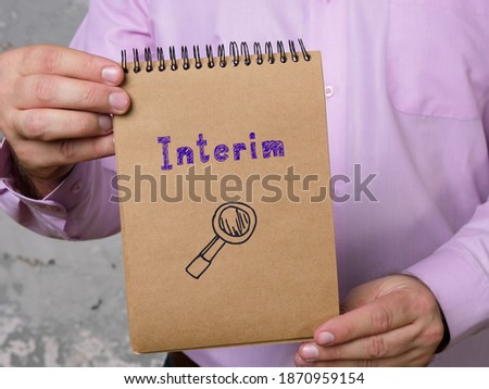  Financial concept about Interim with sign on the piece of paper. Foto d'archivio © 