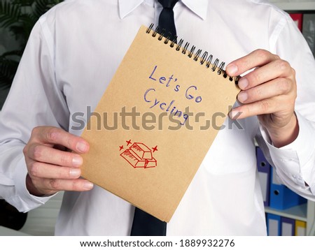 Business concept meaning Let's Go Cycling p with sign on the page. Stock fotó © 
